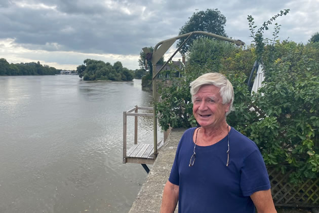 Christopher Moore outside his home on Hammersmith Terrace