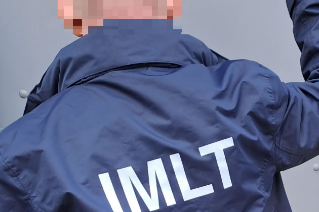 Illegal Money Lending Team (IMLT) officers executed the warrant 