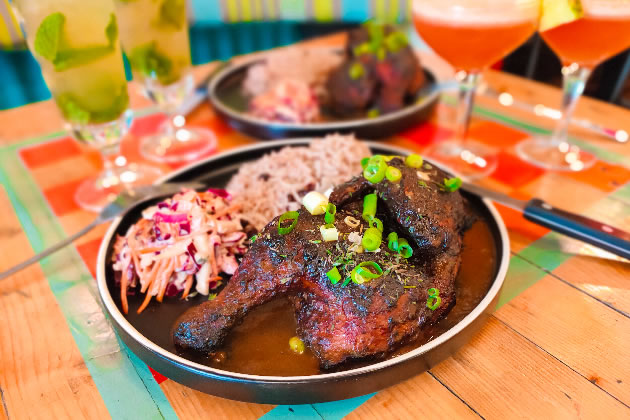 Chargrilled jerk chicken is marinaded for at least 24 hours