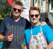 Servig up food at St James Street Festival