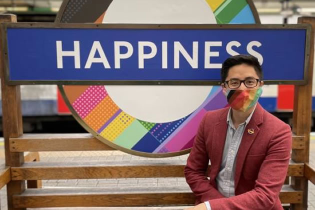 Resident artist Dan Vo, who has lived in H&F for almost a decade, pictured with his Happiness roundel