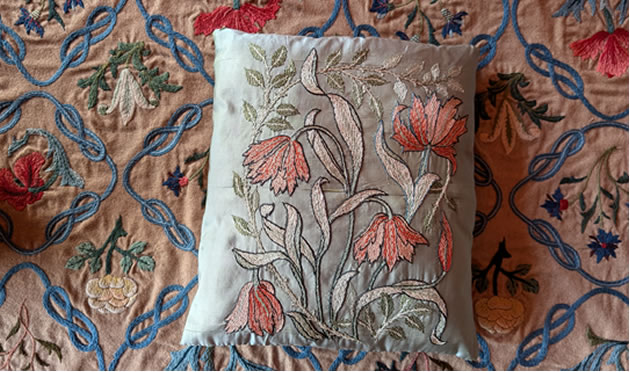 Silk cushion designed by May Morris and embroidered by Dorothy Walker