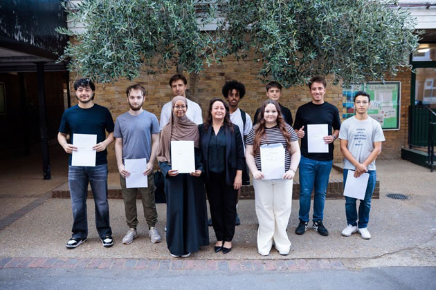 Miss Johnson (centre) with Fulham Cross A-level students 