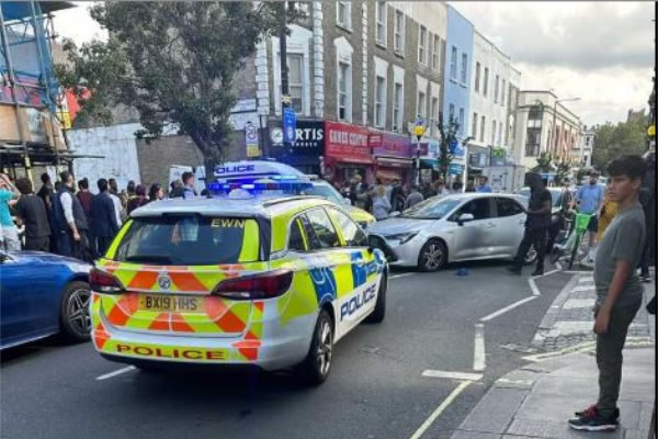 Police on the scene of the crash on North End Road