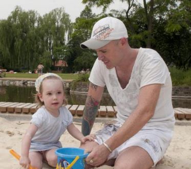 Enjoying the beach in Bishops Park in Fulham