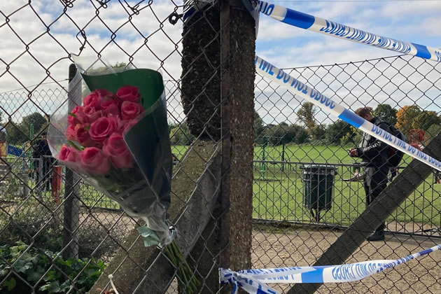 Flowers left at the scene of the killing near Richmond College 
