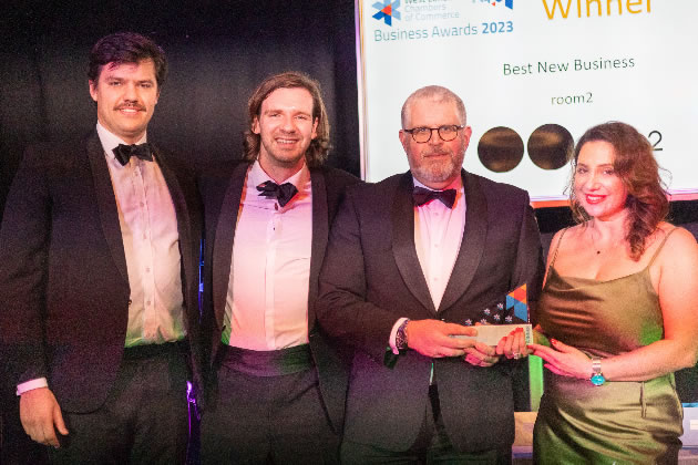 Representatives of Room2 receive their Best New Business award